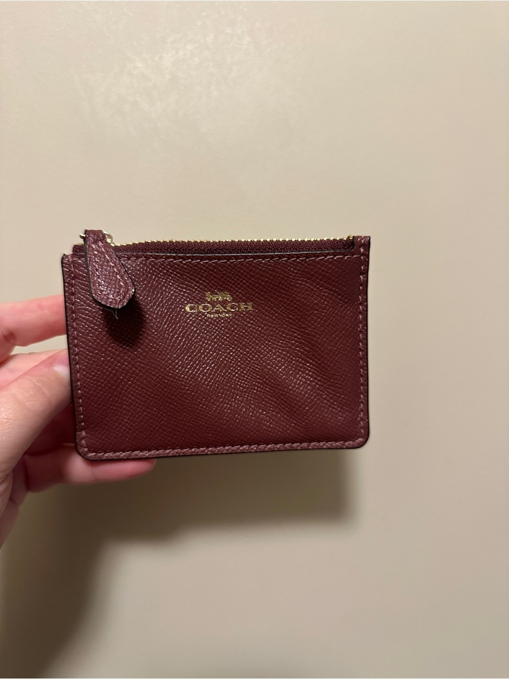 Coach Burgundy Leather Zip Card Holder with Gold Logo